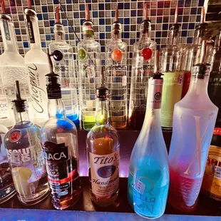 a variety of liquor bottles