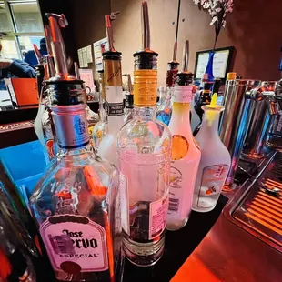 a variety of liquor bottles