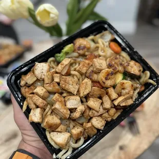 Chicken and shrimp over spicy udon and veggies.