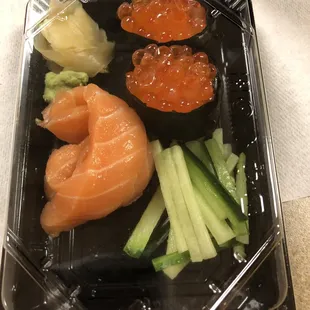 Salmon sashimi &amp; ikura sushi.