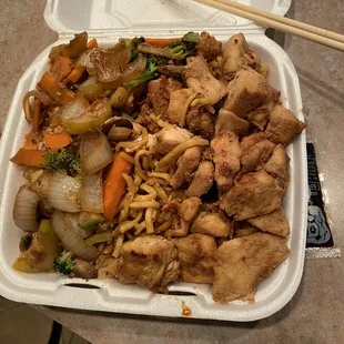 Lots of chicken, veggies, rice , noodles. Yum