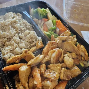 Chicken and shrimp combo with brown rice (didn't realize they charge extra for brown rice)
