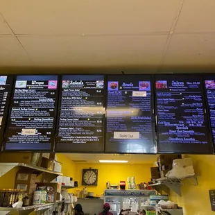 menus on the wall of a restaurant