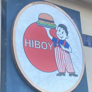 a man holding a hamburger