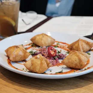 a plate of appetizers on a table