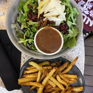 Pear salad with dried cranberries, candied pecans, and cinnamon brown sugar vinaigrette, side of French Fries