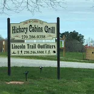 Front signage with next door Lincoln Trail Outfitters