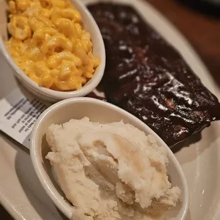 Ribs with garlic mashed potatoes and macaroni and cheese