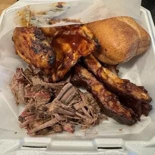 brisket, beef ribs, quarter bbq chicken, garlic bread