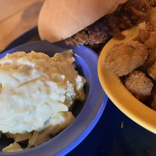 Potato salad, fried okra, chopped breed sandwich