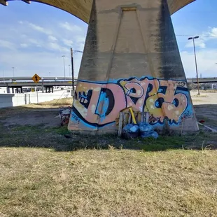 Nestled under the bridge