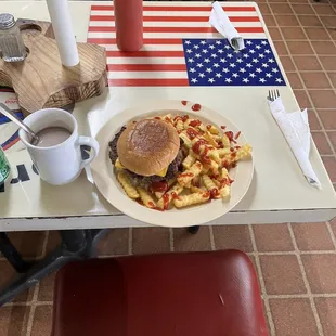This is a cheeseburger with french fries and plenty of ketchup for the amazing price of $7.77 cheeseburger basket