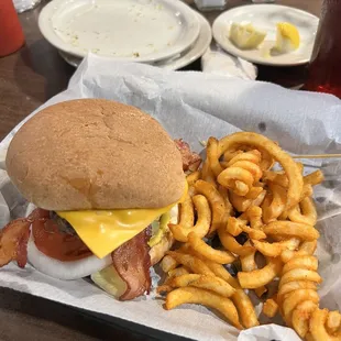 a bacon cheeseburger and fries