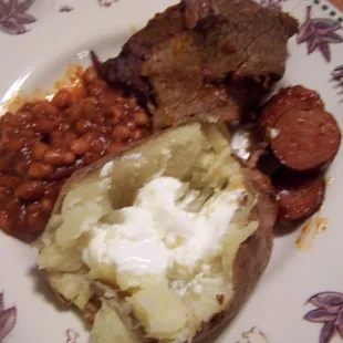 Brisket, smoked sausage, baked beans &amp; potato