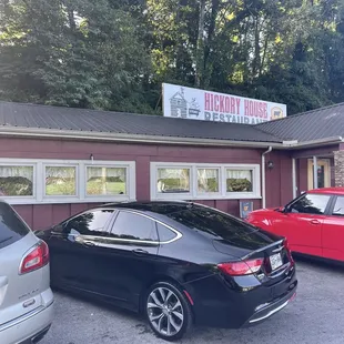 cars parked in front of the restaurant
