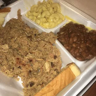 Pulled pork plate with mac and cheese and baked beans.