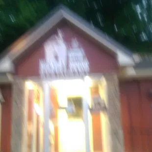 a blurry photo of the outside of the building