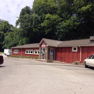 a car parked in front of it