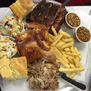 Hog Mania - 1/2 lb BBQ, 1/2 rack, 1/2 chicken, fries, slaw, baked beans and corn bread