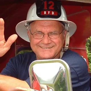 John B.