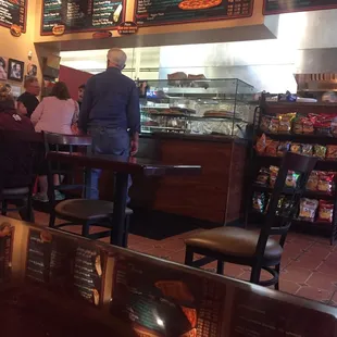 a man standing in front of the counter