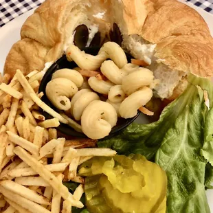 Our Famous Chicken Salad Sandwich on a Croissant . Honestly- I can live without the grapes.