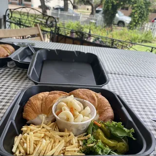 Turkey, Swiss Cheese, Avocado Spread on Croissant