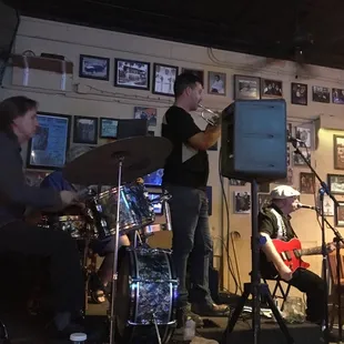 a band playing in a pub