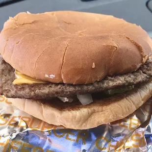 Regular burger ordered with cheese. Cheeseburger provided.