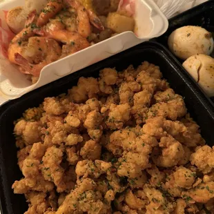 Steamed Shrimp w/ potatoes and corn; crawfish and conch fried rice; and a side of boiled eggs.