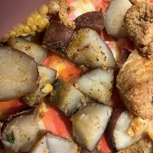 INEDIBLE RAW POTATOES. UNDERCOOKED HUSH PUPPIES AND OVERCOOKED CORN.