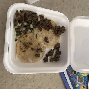 Ordered four tacos and a drink, then drove 45 minutes back home to find this...