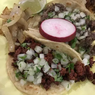 Chorizo, cabeza, pastor tacos w/ side of onions and lime.