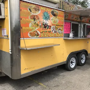 a food truck parked in a parking lot