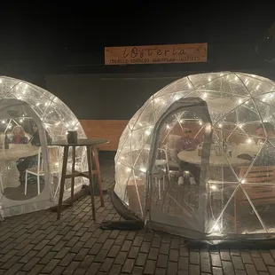 two inflatable tents with lights
