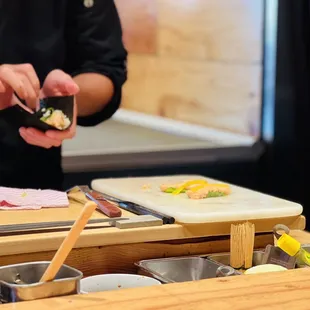 a chef preparing food in a kitchen