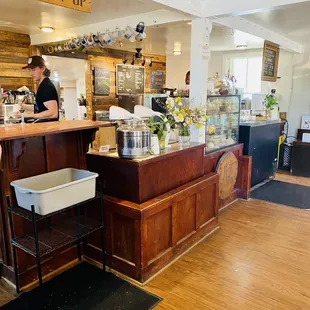 a woman behind the counter