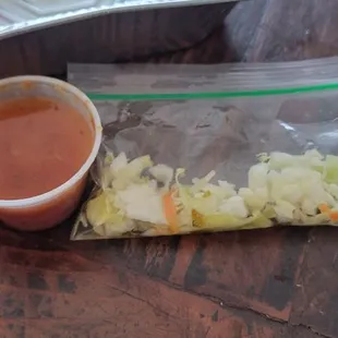 Small curtido very watered down regular sauce