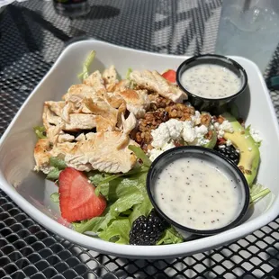 a bowl of salad with dressing
