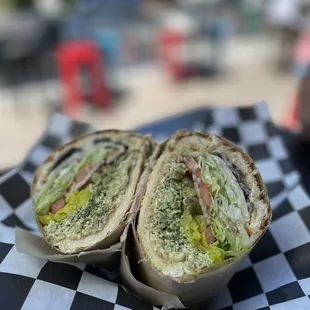 The hills sandwich - provolone, pesto, veggies, shredded chicken, grilled mushroom on Dutch crunch