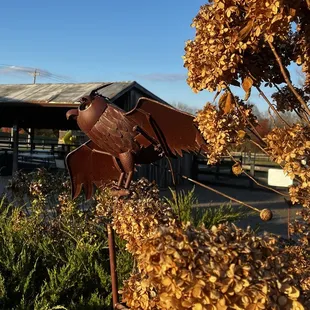 Metal owl art on the patio