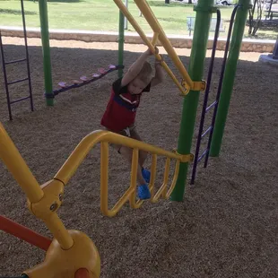 Playing on tilted monkey bars