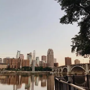 Patio seating with Minneapolis skyline views.