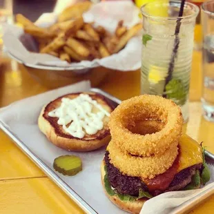 Burgers, fries, and a mojito on the patio.