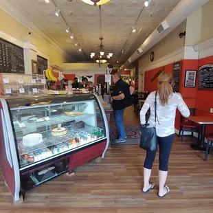 a woman standing in front of the counter