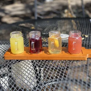 Mimosa flight (Pineapple, Blueberry pomegranate, peach blossom, raspberry)