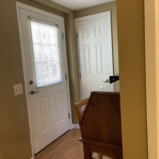 Entry door from exterior of building/room.