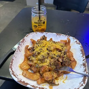 Cajun Poutine Fries. F@*!ing amazing oh and their hurritang drink. Guaranteed to make your day better.