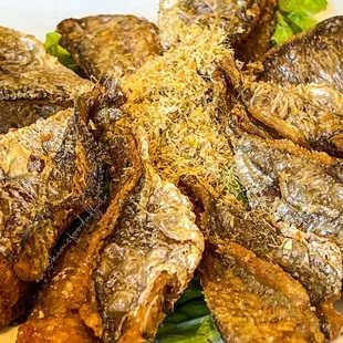 a plate of grilled fish