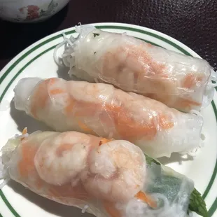 a plate of shrimp rolls